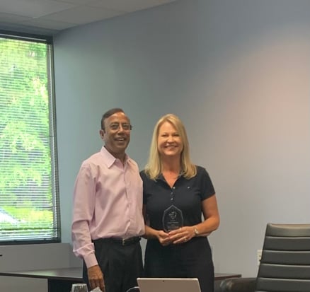 Ashok Mathur posing with Debbie McNeil