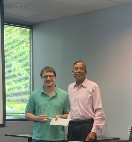 Ashok Mathur posing with Sean Compton