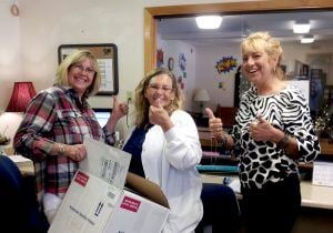 Jessica Gilbert, Cynthia Reech, Diedre Serene of Marion County Health Department give thumbs up for Patagonia Health EHR.