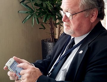 Scott Lenhart Health Director for Stokes County Health Department demos the EHR Reporting of Dashboard App on mobile phone