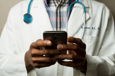 Doctor using EHR Apps