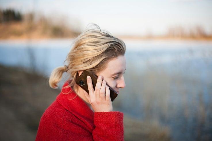 Patient on mobile phone, using patient portal